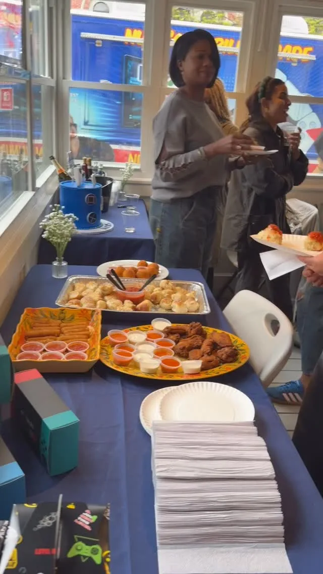 Food set out for a gathering at Rosa Harlem
