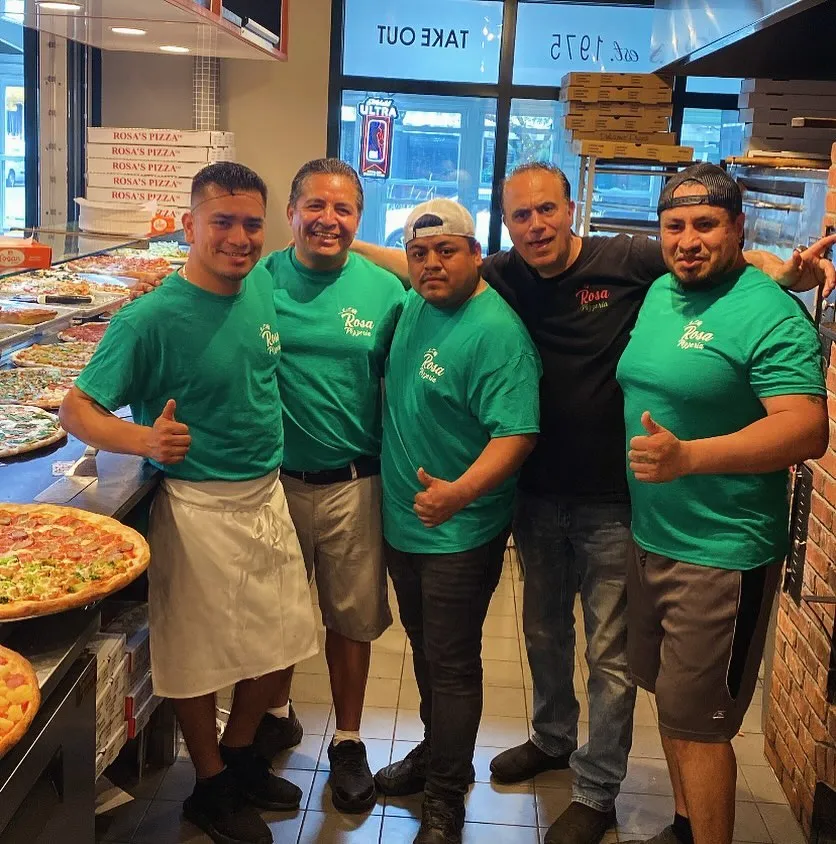 The Rosa Harlem team together at the pizzeria